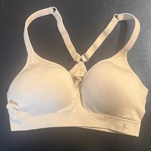 Beige Danskin Now Wireless Padded Adjustable Racerback Sports bra.